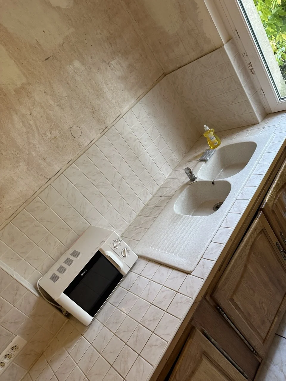 Après : évier et surfaces nettoyés